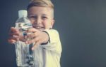 boy-holding-water-bottle