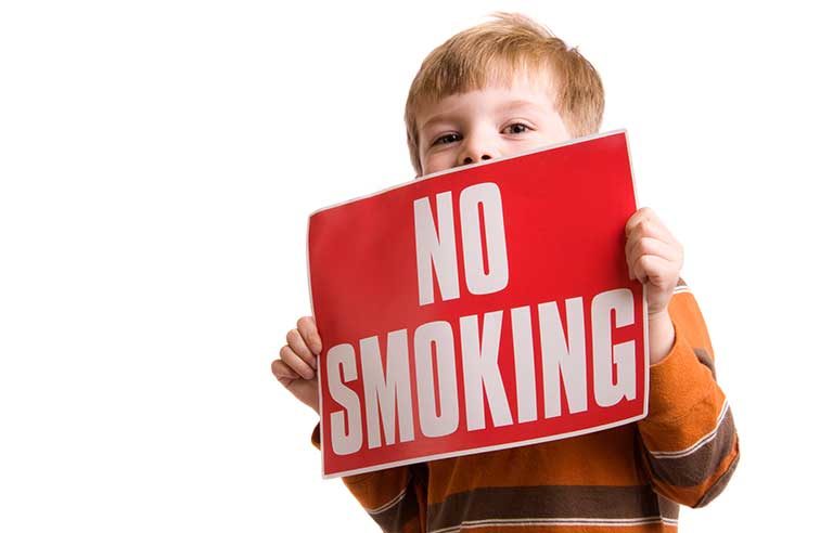 child with n smoking sign