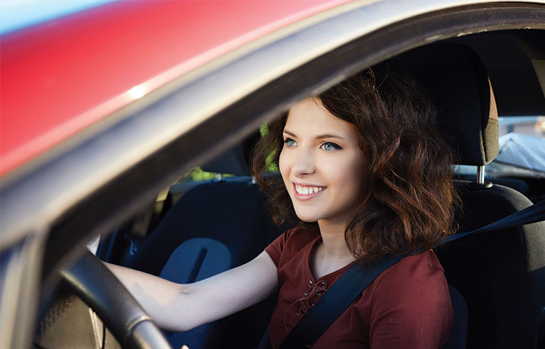 young woman driving
