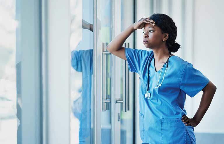 female nurse stressed