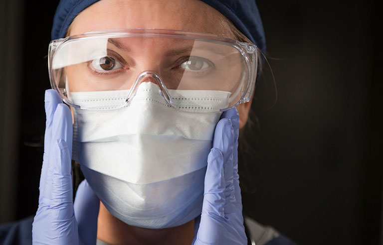 Close up of nurse with mask
