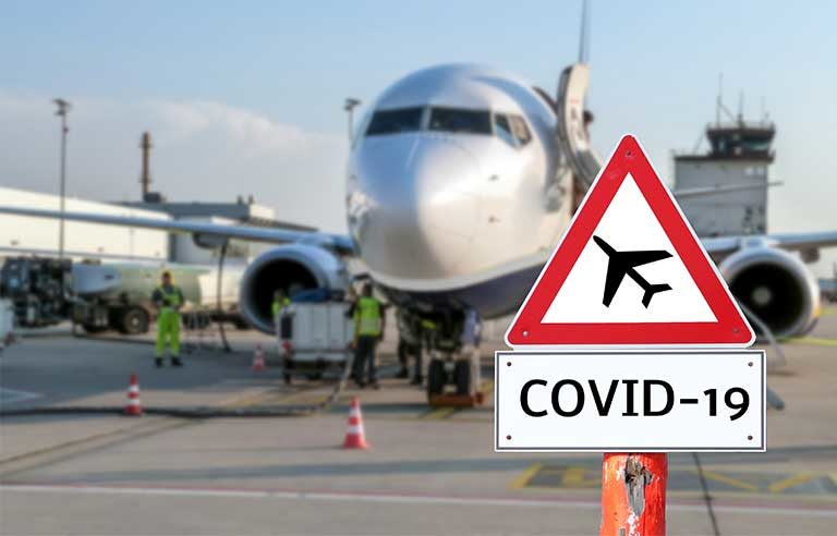 airport-covid-warning