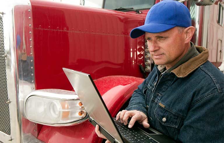 truck-driver-with-laptop.jpg