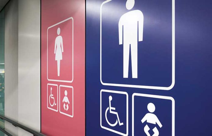 Male and female bathroom signs