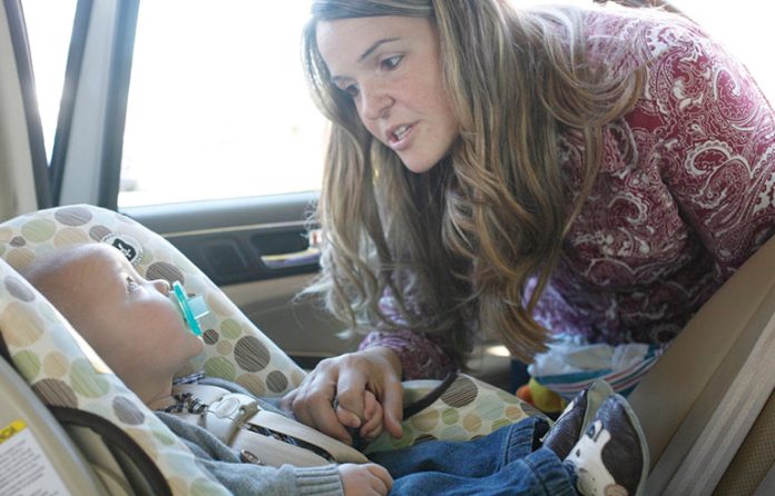 child in a car seat