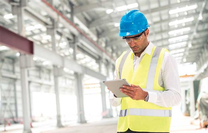 construction worker writing