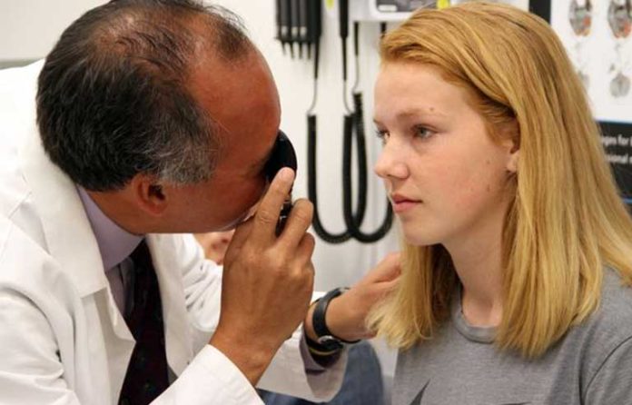 eye doctor with patient