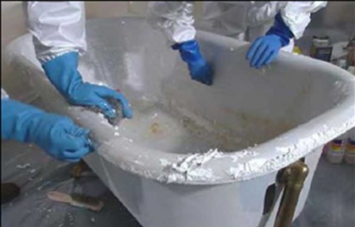 removing paint tub