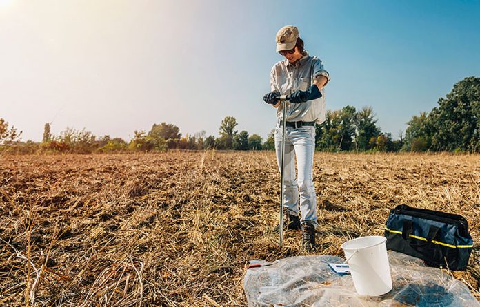 agronomist taking samples