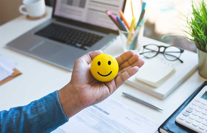 Emoji smile ball on desk