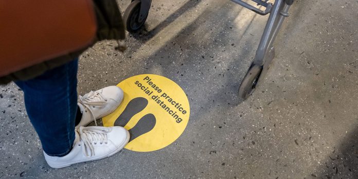 Grocery store social distance sign