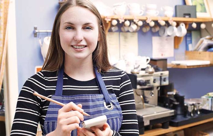 teen worker in coffee shop
