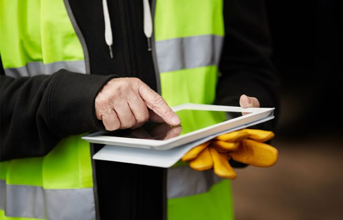 worker using an iPad