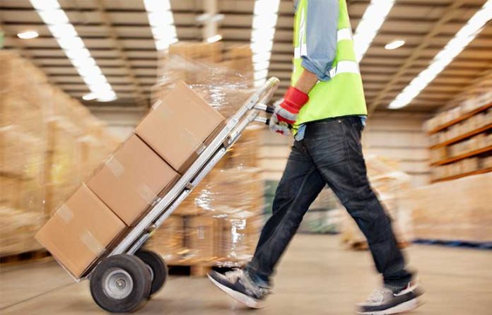 worker-pushing-trolley.jpg