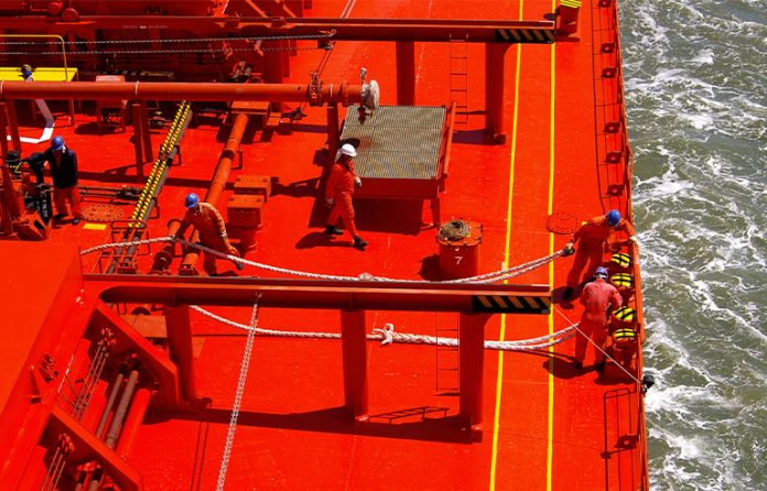 Ship crew on vessel