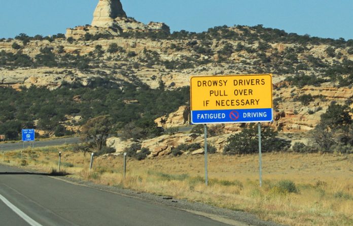 Drowsy driving road sign