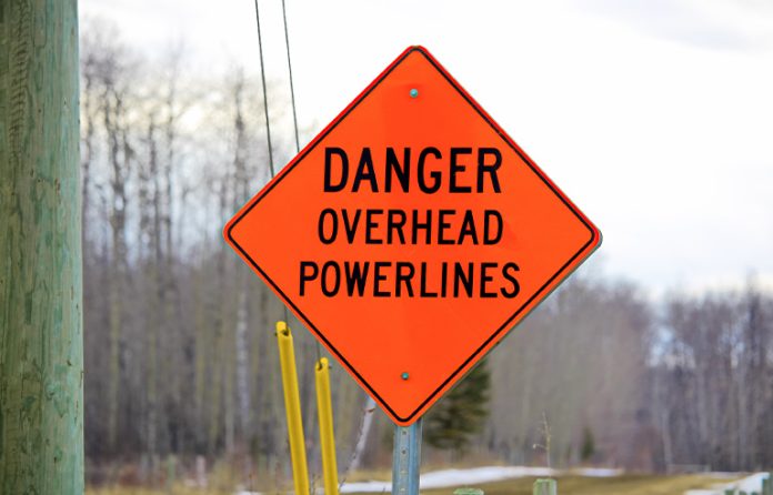 Overhead power lines sign