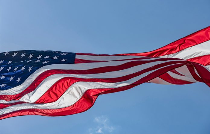 U.S.-flag American flag flying in wind